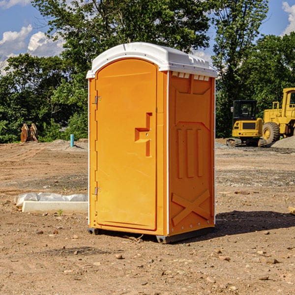 how often are the portable restrooms cleaned and serviced during a rental period in Ansted